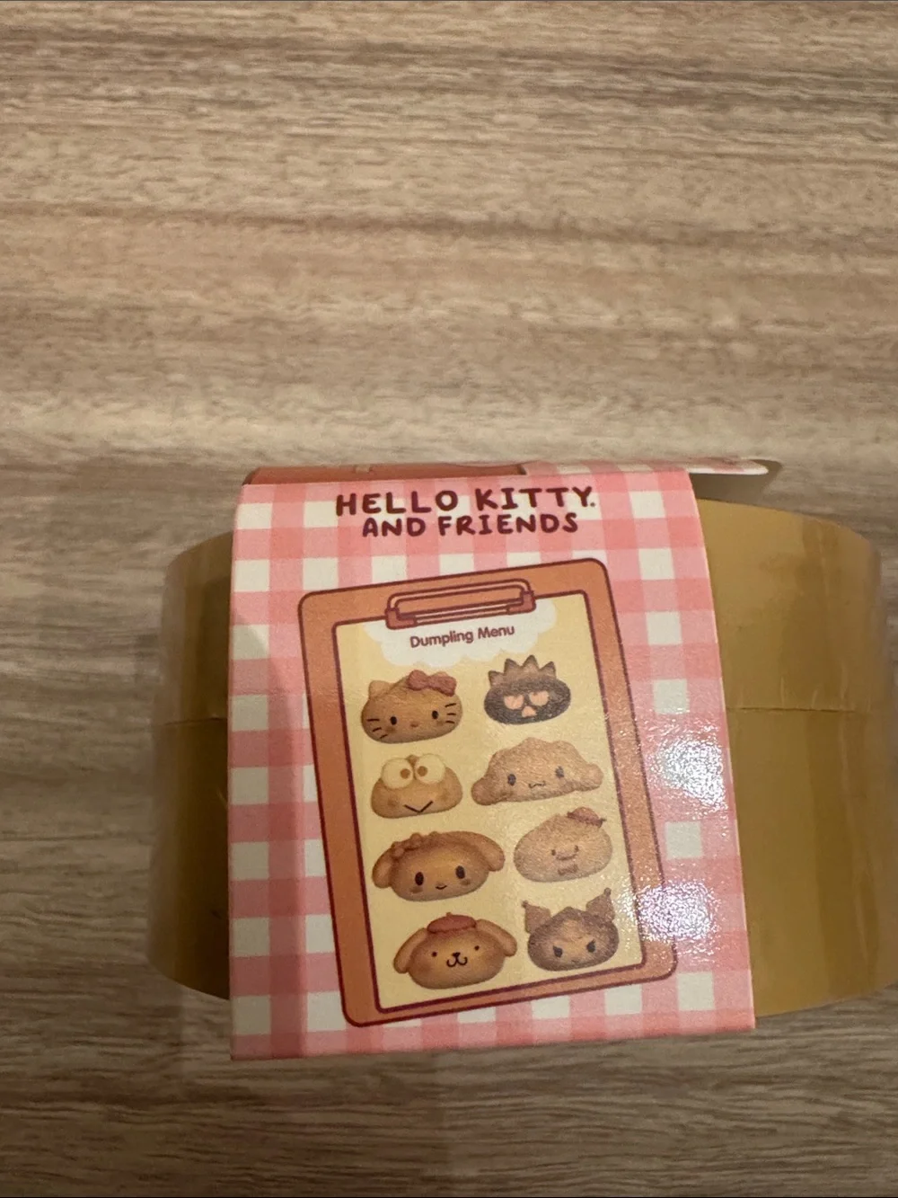 Sanrio Hello Kitty Mystery Squishy Dumpling - Cream & Yellow